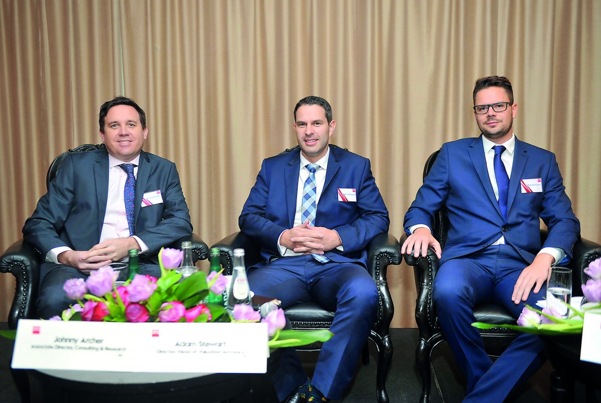 Johnny Archer (left), Head of Consulting and Research, DTZ/Cushman & Wakefield; Adam Stewart (centre), Director and Head of Valuation Advisory, Qatar and Richard Rayner, Associate Director, Valuation Advisory and Investment, discussing the findings of the