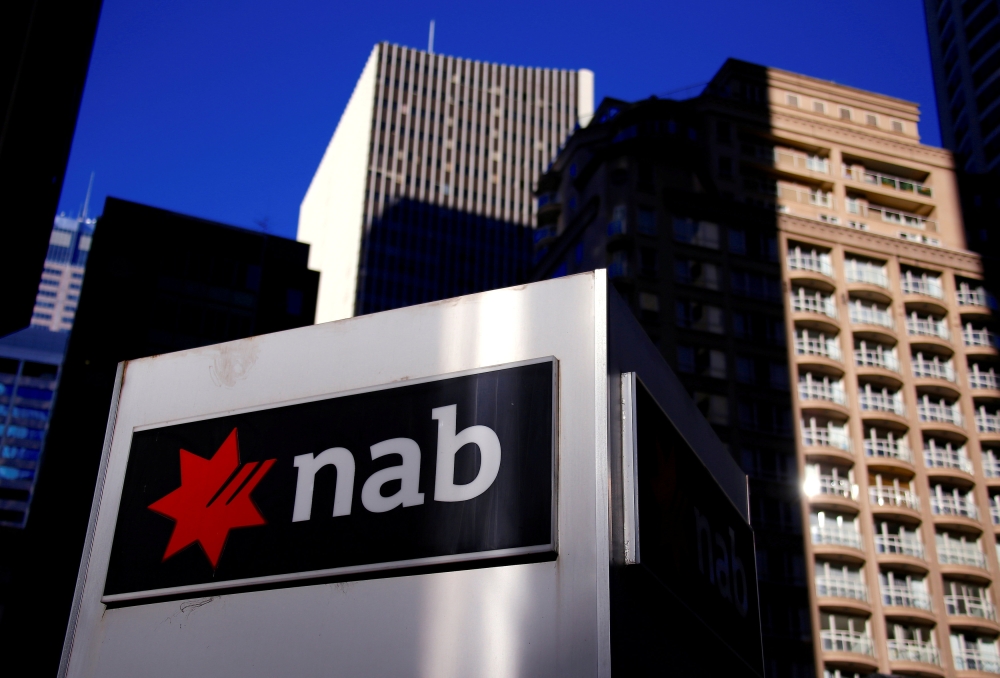 File photo of the logo of the National Australia Bank is displayed outside their headquarters building in central Sydney, Australia August 4, 2017. REUTERS/David Gray/File Photo