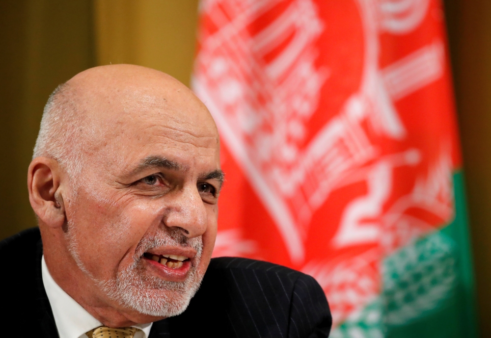 FILE PHOTO: Afghanistan's President Ashraf Ghani attends a two-day conference on Afghanistan at the United Nations in Geneva, Switzerland, November 27, 2018. REUTERS/Denis Balibouse/File Photo