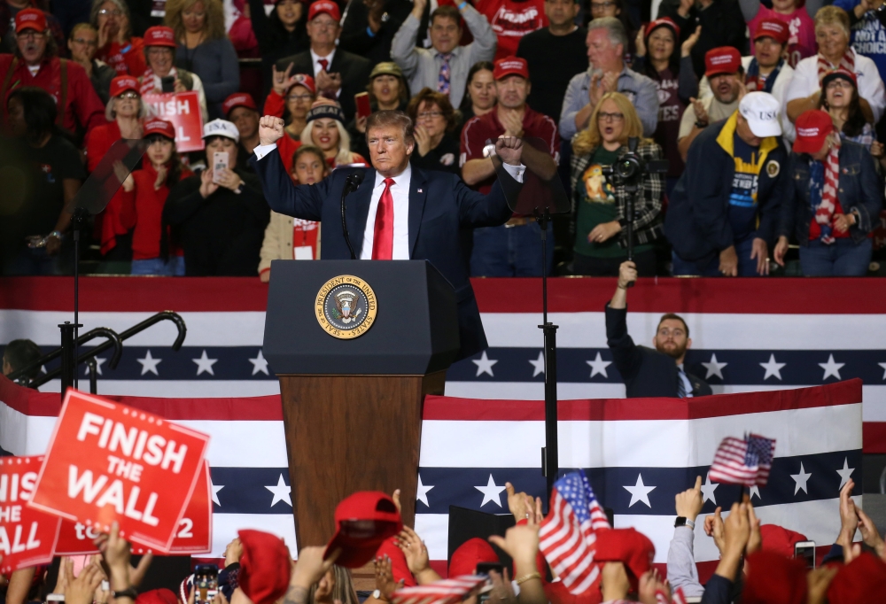 US President Donald Trump reacts during a campaign rally at El Paso County Coliseum in El Paso, Texas, U.S., February 11, 2019. REUTERS/Leah Millis