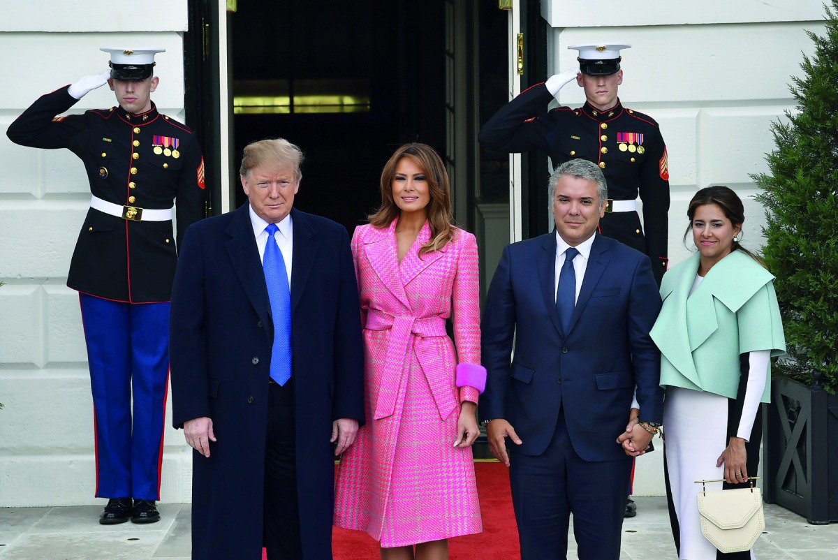 US President Donald Trump and First Lady Melania Trump greet Colombian President Ivan Duque(2ndR) and his wife Maria Ruiz(R) at the White House in Washington, DC, on February 13, 2019. AFP / Nicholas Kamm