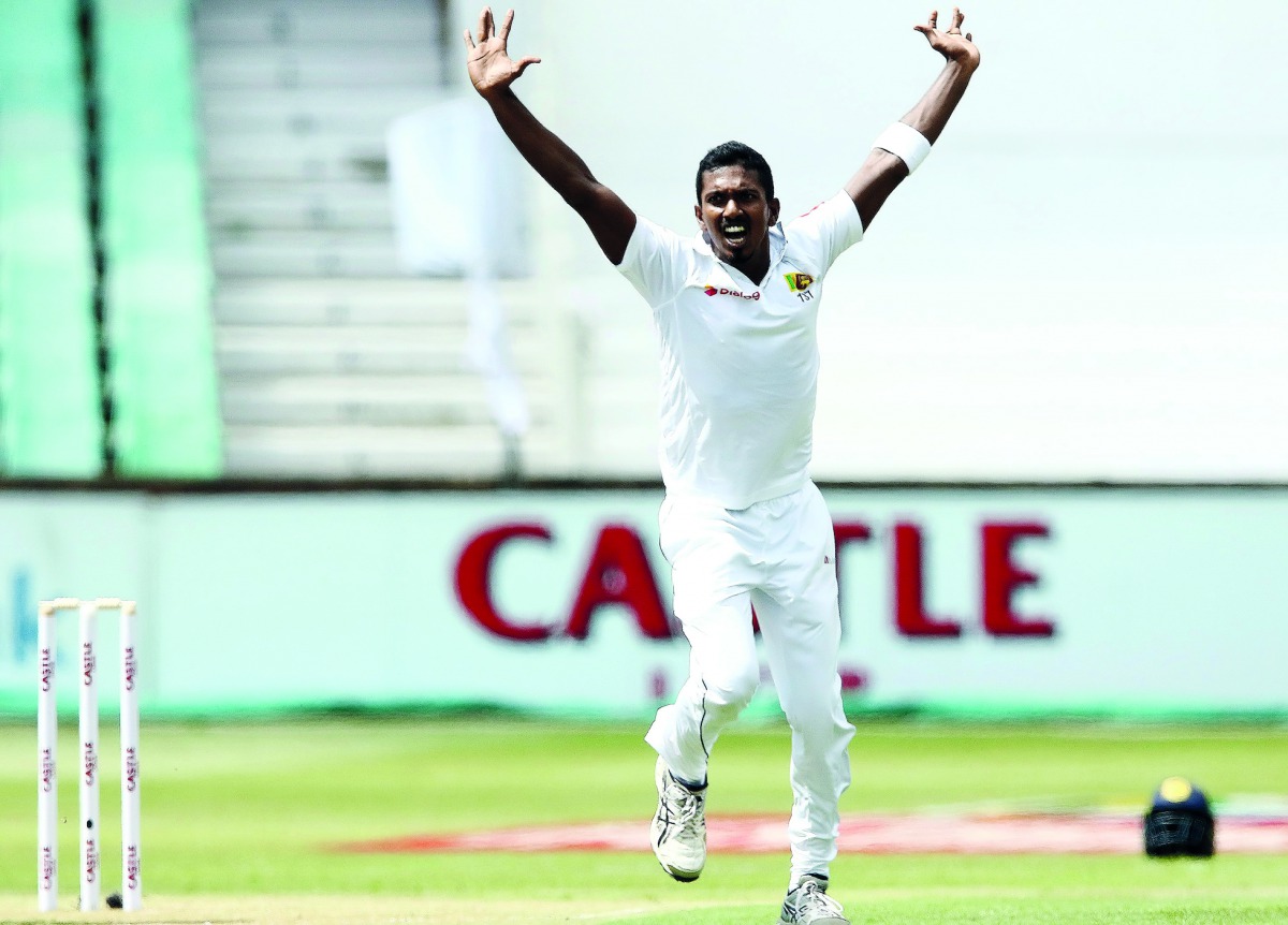 Sri Lanka's Vishwa Fernando appeals and gets the wicket of South Africa's Dean Elgar in the second over during day 1 of the first Test cricket match between South Africa and Sri Lanka held at the Kingsmead Stadium in Durban on February 13, 2019. AFP / Ane