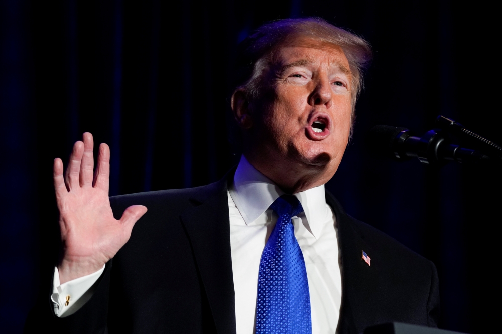 U.S. President Donald Trump delivers remarks at the Major County Sheriffs and Major Cities Chiefs Association Joint Conference in Washington, U.S., February 13, 2019. REUTERS/Kevin Lamarque