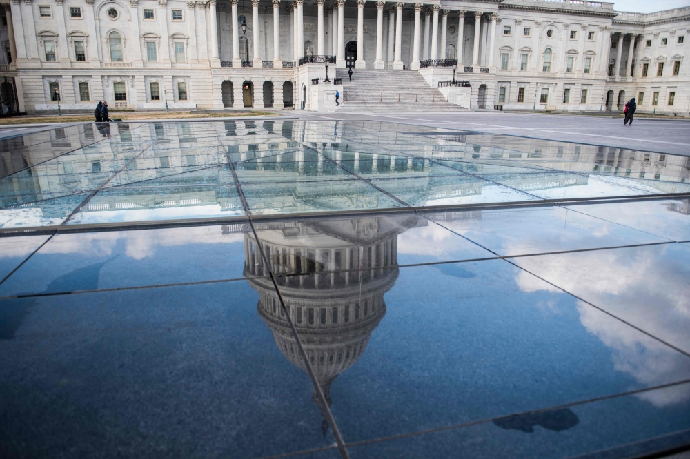 In this file photo taken on December 24, 2018 The US Capitol is seen in Washington DC.  / AFP / Eric BARADAT
 