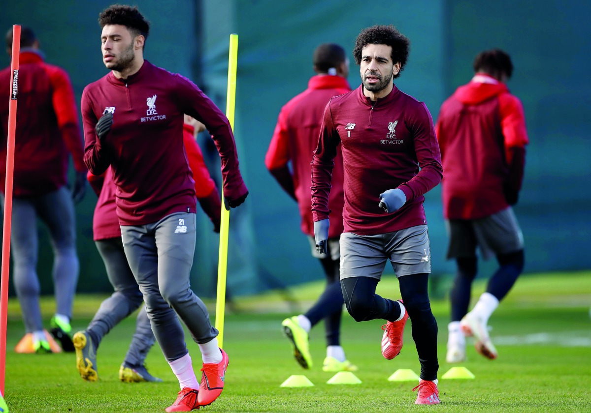 Liverpool's Mohamed Salah and Alex Oxlade-Chamberlain during training. Action Images via Reuters/Carl Recine 