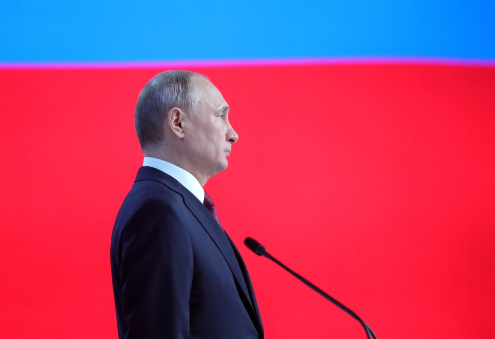 Russian President Vladimir Putin addresses the Federal Assembly, including the State Duma parliamentarians, members of the Federation Council, regional governors and other high-ranking officials, in Moscow, Russia February 20, 2019. Mikhail Klimentyev
