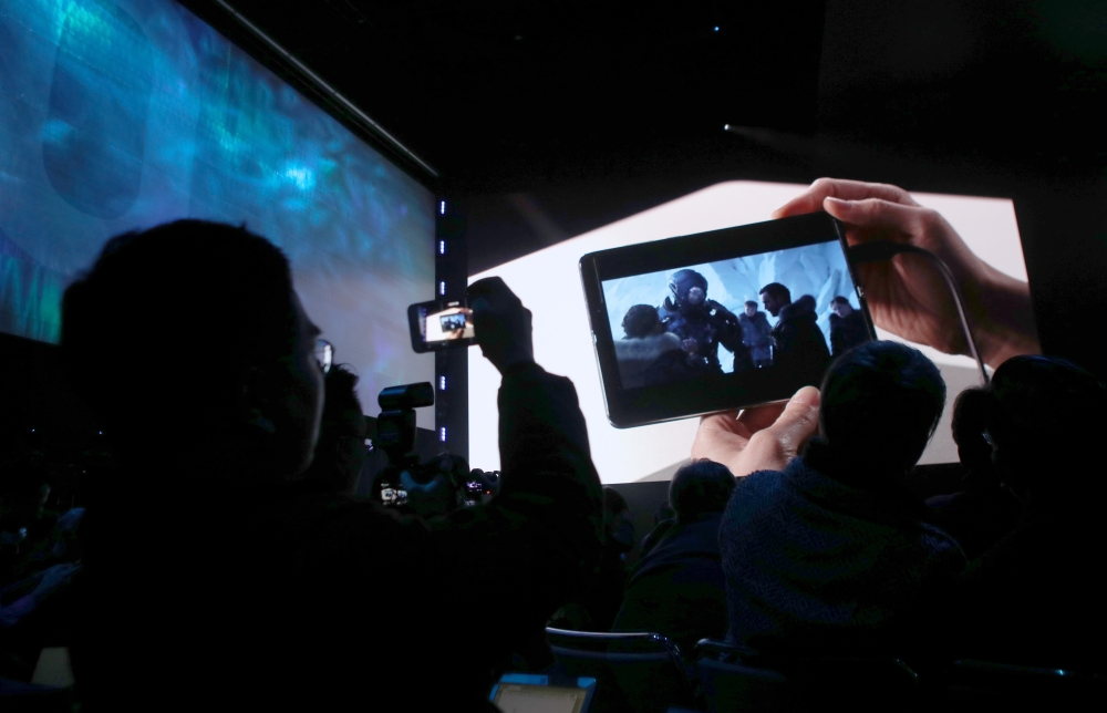 Attendees watch a demonstration of the new Samsung Galaxy Fold smartphone during the Samsung Unpacked event on February 20, 2019 in San Francisco, California. Justin Sullivan/Getty Images/AFP