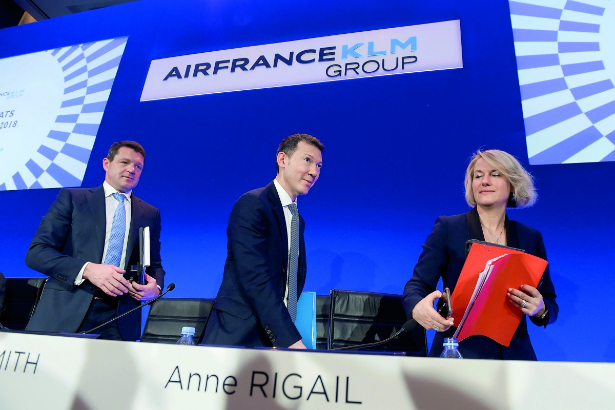 Air France-KLM Chief Executive Officer Benjamin Smith (C), KLM President and CEO Pieter Elbers (L) and Air France CEO Anne Rigail (R) leave after attending the press conference for the group's 2018 financial year results in Paris on February 20, 2019. AFP