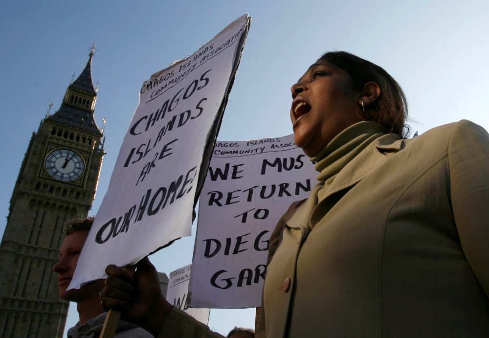 A demonstrator demanding her return to the Chagos Islands in the Diego Garcia archipelago shouts during a protest outside the Houses of Parliament in London October 22, 2008. Reuters/Andrew Winning