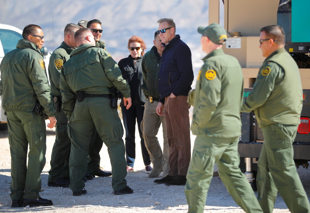:U.S. Acting Secretary of Defense Patrick Shanahan meets with Border Patrol Agents during a tour of the US-Mexico border at Santa Teresa Station in Sunland Park, N.M., U.S. February 23, 2019. Pablo Martinez Monsivais/Pool via REUTERS