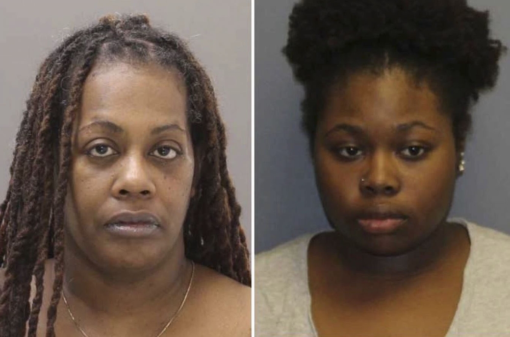Suspects Shana Decree (L) and Dominique Decree who have been charged after five of their relatives were found dead in a Morrisville, Pennsylvania apartment. 