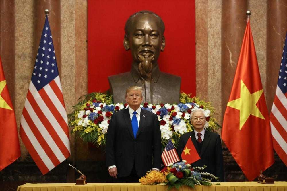 US President Donald Trump and Vietnamese President Nguyen Phu Trong stand before a signing ceremony at the Presidential Palace in Hanoi, Vietnam, February 27, 2019. REUTERS/Leah Millis