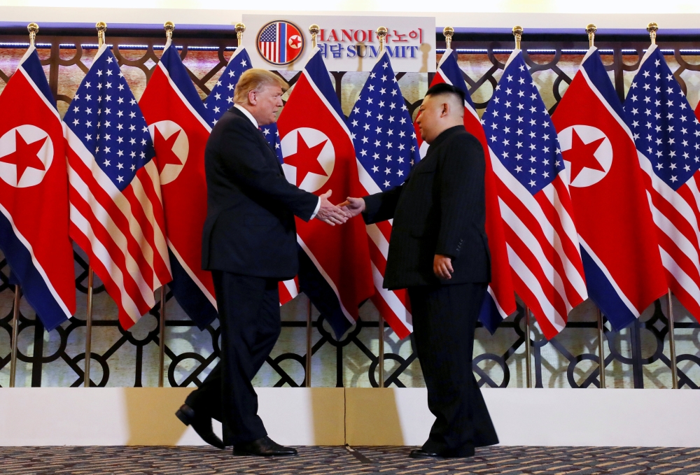 US President Donald Trump and North Korean leader Kim Jong Un shake hands before their one-on-one chat during the second US-North Korea summit at the Metropole Hotel in Hanoi, Vietnam February 27, 2019. Reuters/Leah Millis