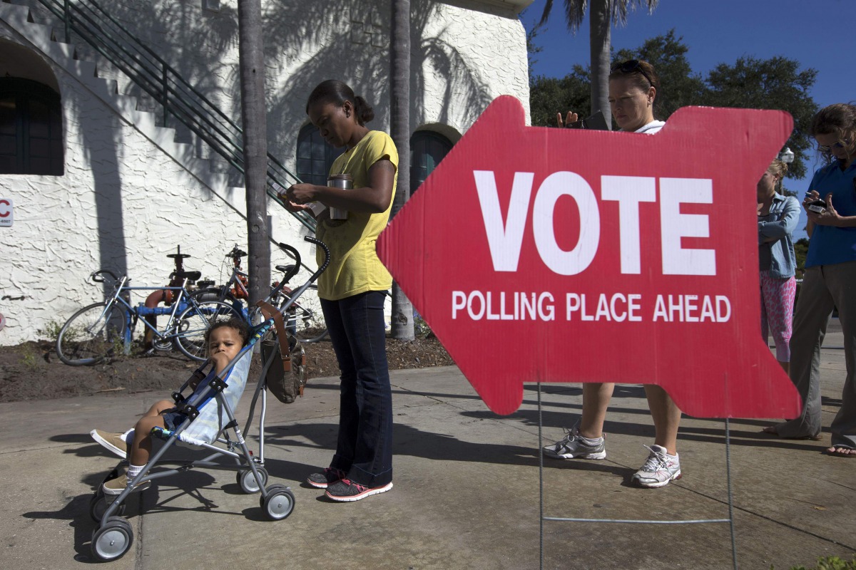 Voters head to the polls during the US presidential election in St Petersburg, Florida, November 8, 2016. Reuters/Scott Audette