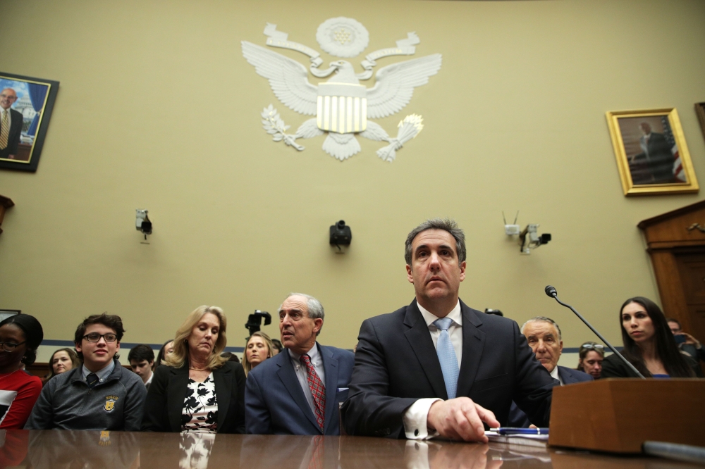  Michael Cohen, former attorney and fixer for President Donald Trump, testifies before the House Oversight Committee on Capitol Hill February 27, 2019 in Washington, DC. Alex Wong/Getty Images/AFP