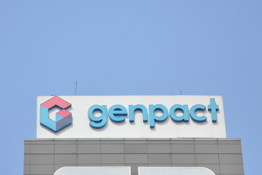 The logo of Genpact is seen on the facade of its building in Bengaluru, India, January 29, 2019. Reuters/Munsif Vengattil