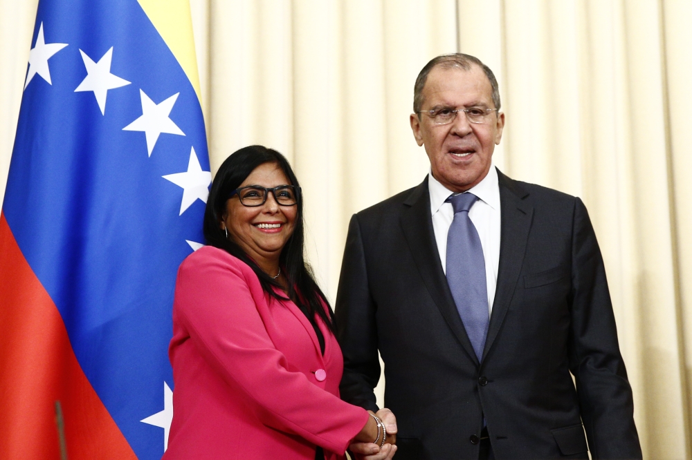 Venezuelan Vice President Delcy Rodriguez (L) and Russian Foreign Minister Sergei Lavrov (R) shake hands at after a joint press conference following their meeting in Moscow, Russia on March 01, 2019. Sefa Karacan - Anadolu 
