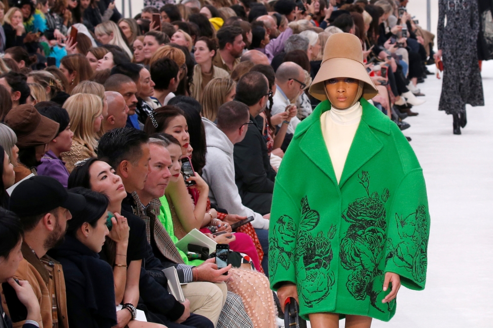 A model presents a creation by designer Pierpaolo Piccioli as part of his Fall/Winter 2019-2020 women's ready-to-wear collection for fashion house Valentino, during Paris Fashion Week, March 3, 2019. Reuters/Regis Duvignau