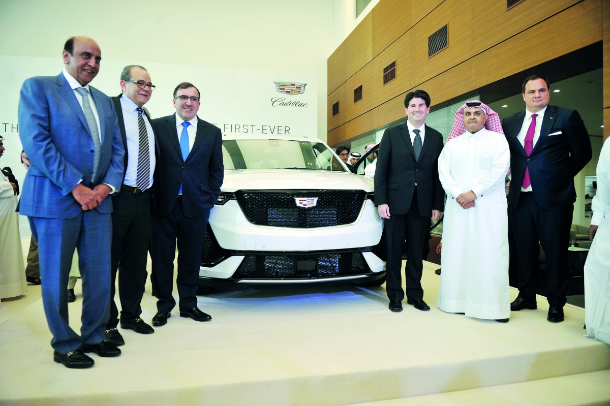 Khalid Ahmed Al Mannai (second right), Vice-Chairman, Mannai Corporation; with Alekh Grewal (left), Group Chief Executive Officer & Director; and other officials during the display of Cadillac XT6 at Cadillac’s new showroom in Industrial Area, yesterday. 