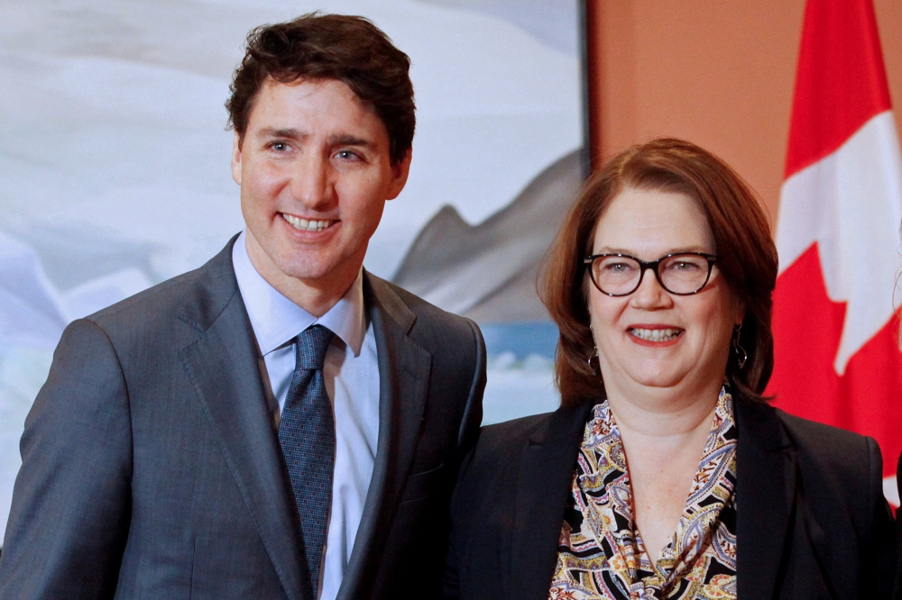 File photo: Newly appointed president of the Treasury Board Jane Philpott poses for a photo with Prime Minister Justin Trudeau during Trudeau's cabinet shuffle, in Ottawa, Ontario, Canada, January 14, 2019. REUTERS/Patrick Doyle/File Photo