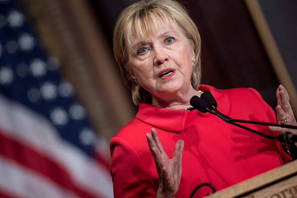 FILE PHOTO: In this file photo taken on March 31, 2017 former US Secretary of State Hillary Clinton speaks during an awards ceremony for the Georgetown Institute for Women at Georgetown University on March 31, 2017 in Washington, DC. AFP / Brendan Smialow