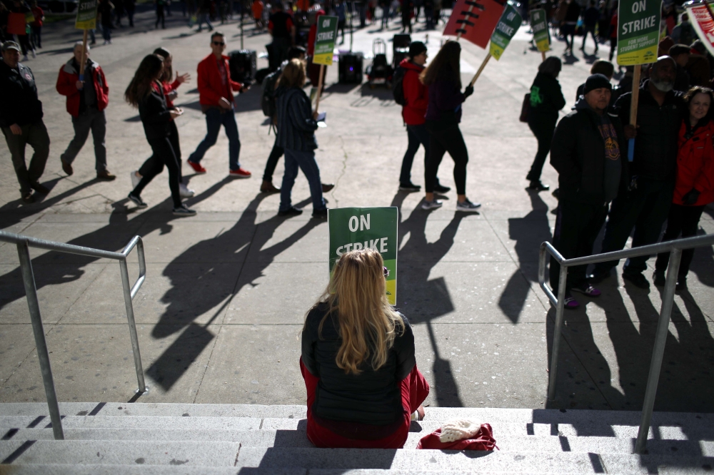 Representational image: Oakland Unified School District students and teachers carry signs as they picket outside of Oakland Technical High School on February 21, 2019 in Oakland (Justin Sullivan/ Getty Images/ AFP)