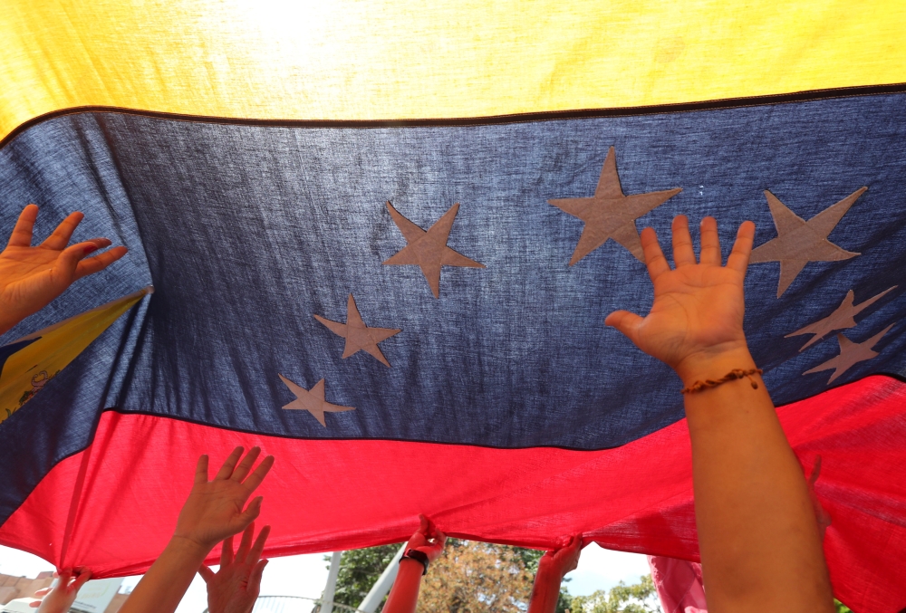 Supporters of the Venezuelan opposition leader Juan Guaido, who many nations have recognized as the country's rightful interim ruler, take part in a rally against Venezuelan President Nicolas Maduro's government in Caracas, Venezuela March 4, 2019. REUTER