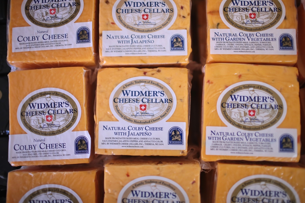 In this file photo taken on June 27, 2016, Colby cheese packages are offered for sale at Widmer's Cheese Cellars in Theresa, Wisconsin.  AFP / Getty Images North America / Scott Olson