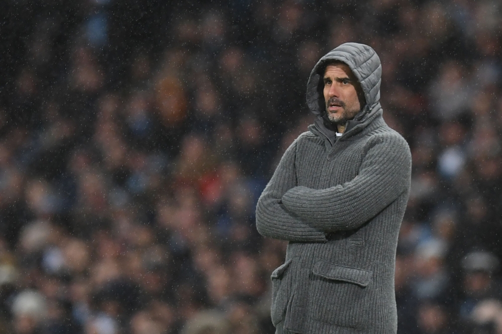 Manchester City's Spanish manager Pep Guardiola gestures during the English Premier League football match between Manchester City and Watford at the Etihad Stadium in Manchester, north west England, on March 9, 2019.  AFP / Paul ELLIS 