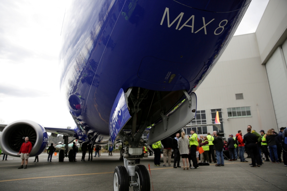 Boeing employees are pictured in front of a 737 MAX 8 produced for Southwest Airlines as Boeing celebrates the 10,000th 737 to come off the production line in Renton, Washington, U.S., March 13, 2018. Reuters/Jason Redmond