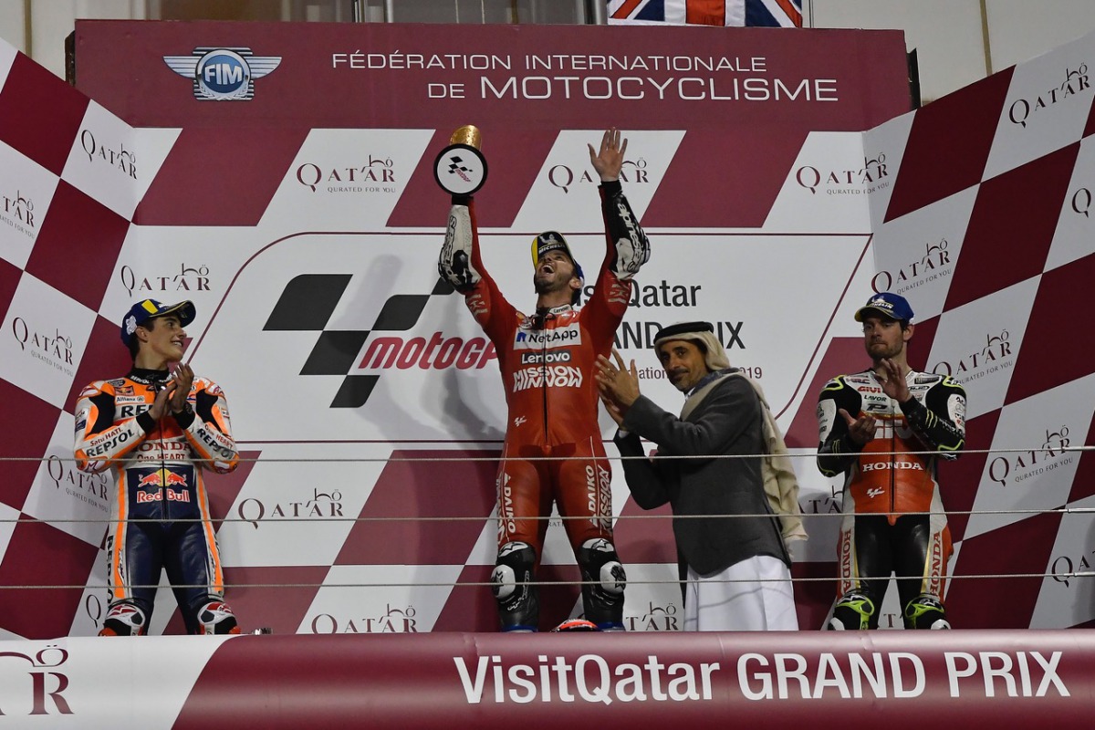 Minister of Culture and Sports H E Salah bin Ghanem Al Ali with the podium winners of the MotoGP event  Andrea Dovizioso, Marc Marquez and Cal Crutchlow at the end of the VisitQatar Grand Priz at the Losail International Circuit,  yesterday.