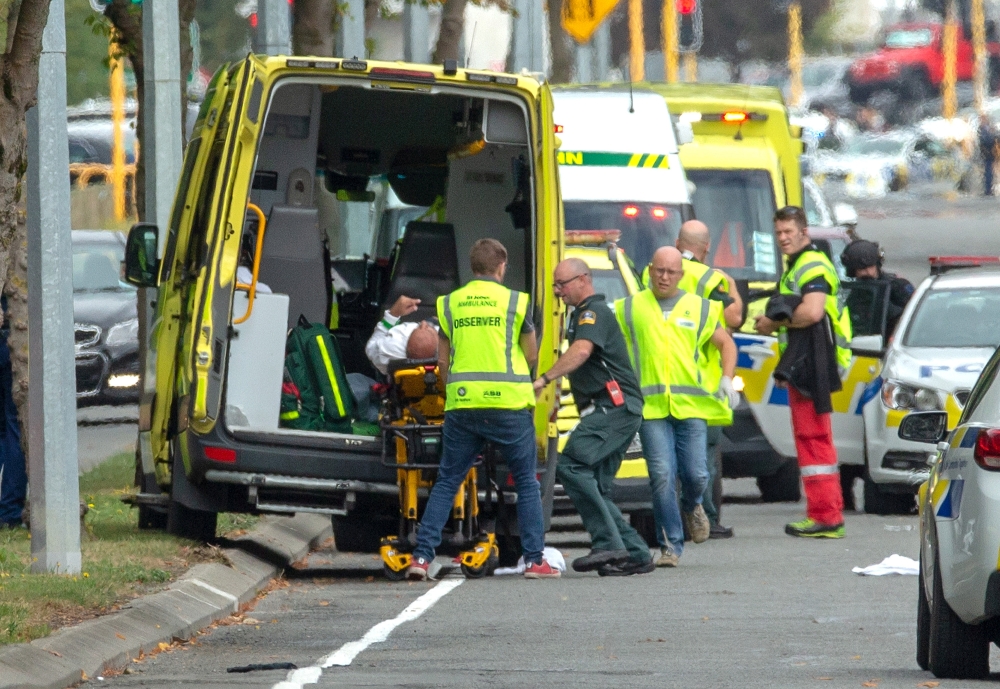 An injured person is loaded into an ambulance following a shooting at the Al Noor mosque in Christchurch, New Zealand, March 15, 2019. REUTERS/SNPA/Martin Hunter 