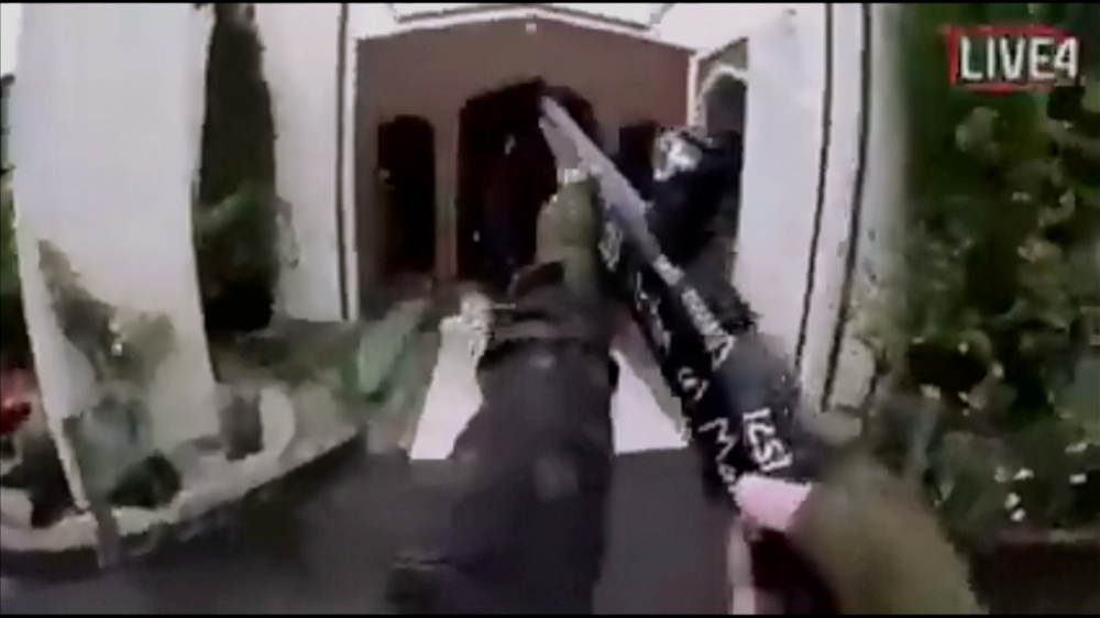 A still image taken from video circulated on social media, apparently taken by a gunman and posted online live as the attack unfolded, shows him entering a mosque in Christchurch, New Zealand, March 15, 2019. Social Media Website/Handout via REUTERS 