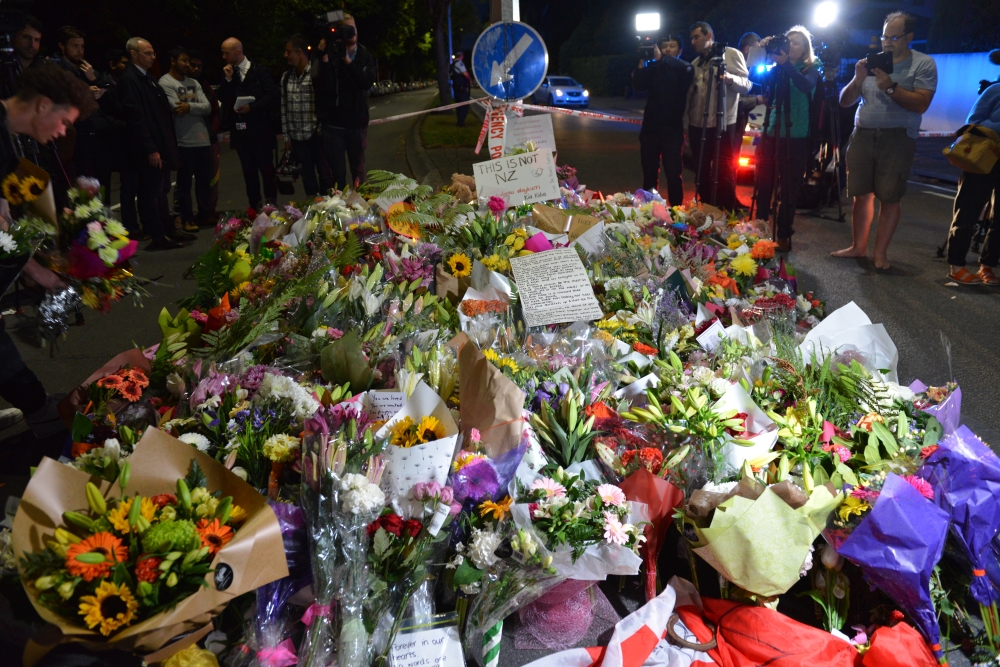 People lay flowers and notes to pay tribute at streets close to the Masjid Al Noor Mosque and Linwood Mosque, shooting area, in Christchurch, New Zealand on March 16, 2019. Recep ?akar - Anadolu
