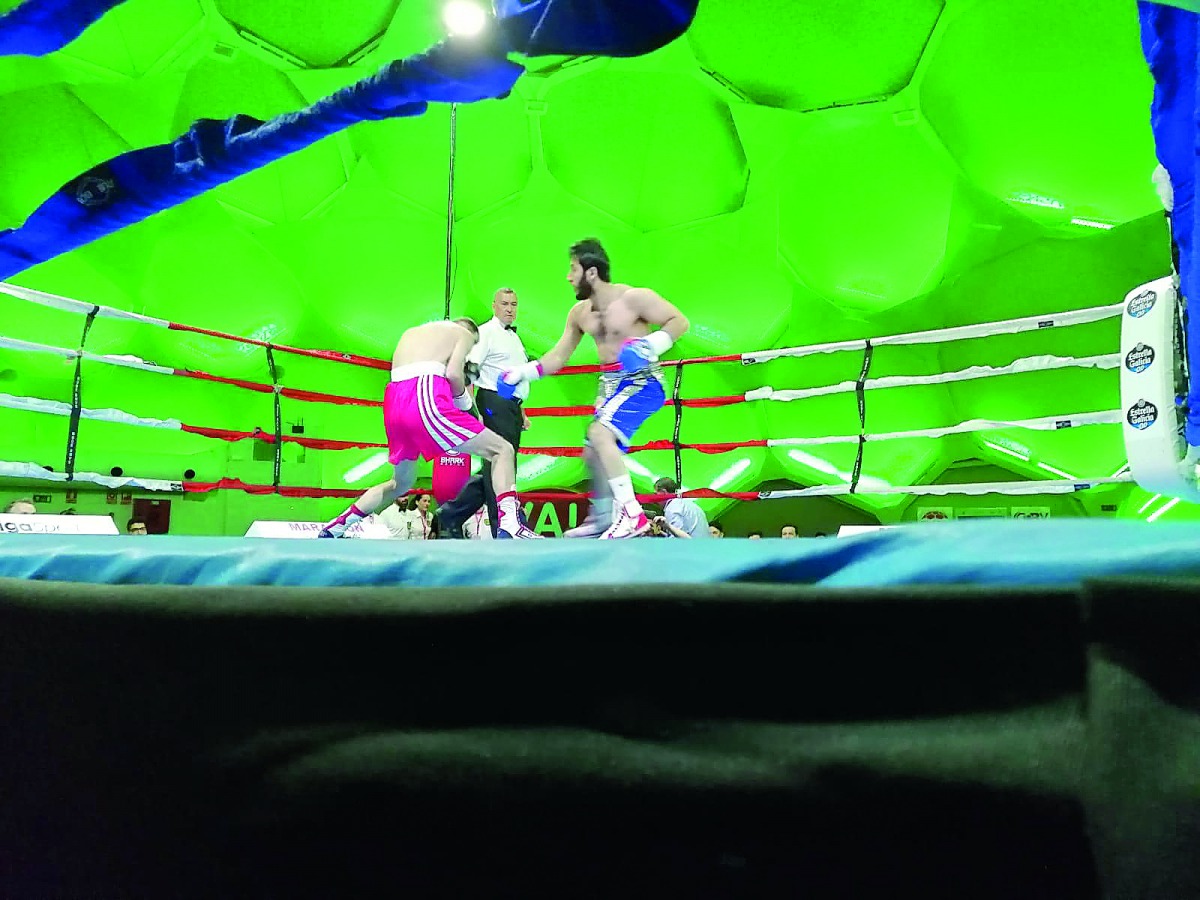 Qatari professional boxer Fahad Thani (right) lands a punch on his Romanian opponent Marius Racaru during their super welterweight clash in Valladolid, Spain, on Friday. 
