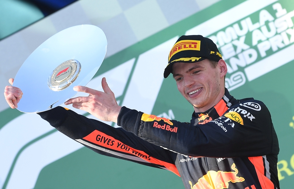 Red Bull's Max Verstappen holds the third place trophy after the Formula One F1 Australian Grand Prix at the Albert Park Grand Prix Circuit in Melbourne, Australia, March 17, 2019. AAP/Julian Smith