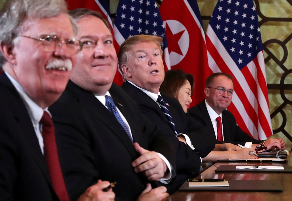 Donald Trump, Mike Pompeo, John Bolton and Mick Mulvaney attend a meeting in the Metropole hotel with Kim Jong Un and delegation in Hanoi, Vietnam, February 28, 2019. Reuters/ Leah Millis