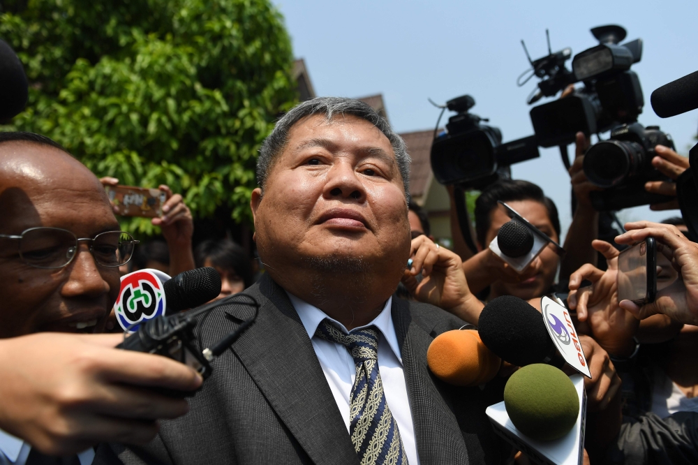 Premchai Karnasuta leaves the court after hearing the verdict against himself and three other suspects in a poaching case at Thong Pha Phum Provincial Court in Kanchanaburi province on March 19, 2019.  / AFP / Lillian Suwanrumpha 