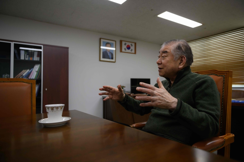 In a photo taken on March 14, 2019 Moon Chung-in, special adviser on national security to South Korea's president Moon Jae-in, speaks with AFP at his office in Seoul. AFP / Ed JONES 