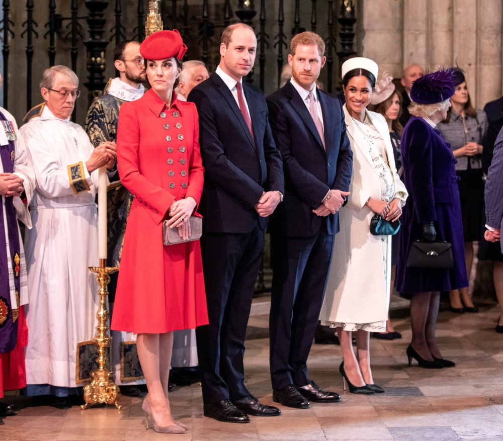 FILE PHOTO: Britain's Prince Harry and Meghan, Duchess of Sussex, stand with Kate, Duchess of Cambridge, and Britain's Prince William at Westminster Abbey for a Commonwealth Day service in London, Britain March 11, 2019. Richard Pohle/Pool via REUTERS/Fil