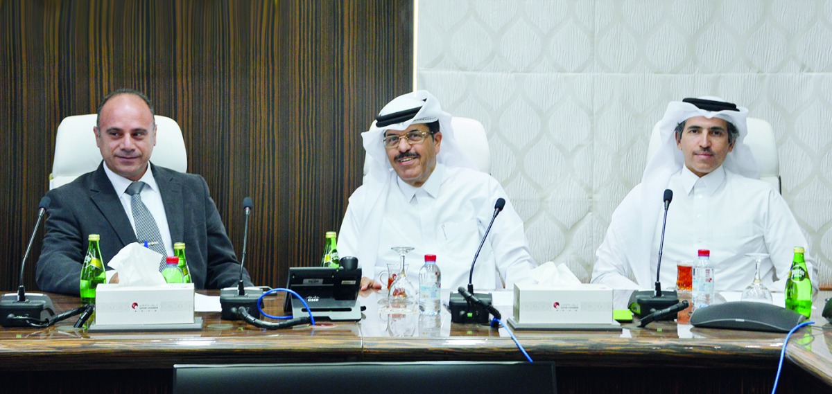 Dr Jabor Fadl Al Nuaimi (centre), presiding over the meeting on behalf of the Chairman of the Committee Mohamed bin Ahmed bin Towar Al Kuwari, First Vice-Chairman of Qatar Chamber, at QC headquarters, yesterday. 