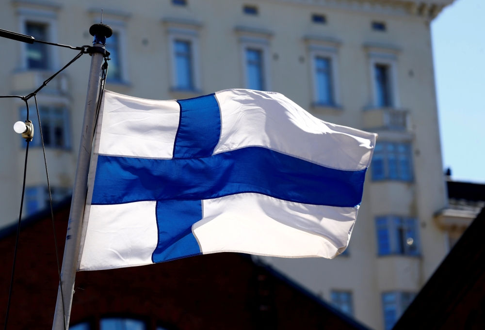 Finland's flag flutters in Helsinki, Finland, May 3, 2017. Reuters/Ints Kalnins