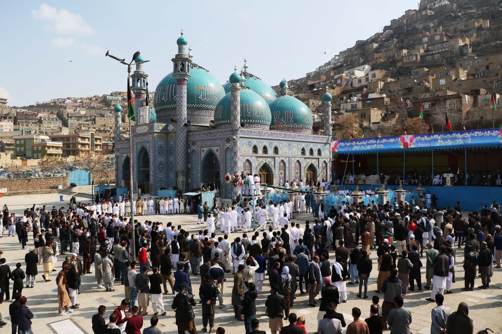 Afghan people gather around the Shrine of Saint Sakhi Saib as they celebrate the Persian New Year Nowruz in Kabul, Afghanistan on March 21, 2019. Haroon Sabawoon - Anadolu