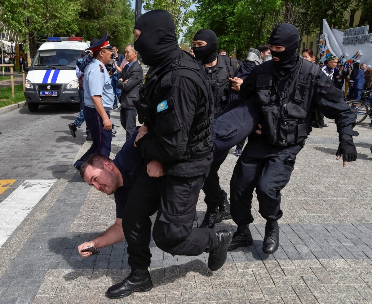File photo of policemen detain an opposition supporter during a protest rally in Almaty, Kazakhstan May 10, 2018. REUTERS/Mariya Gordeyeva