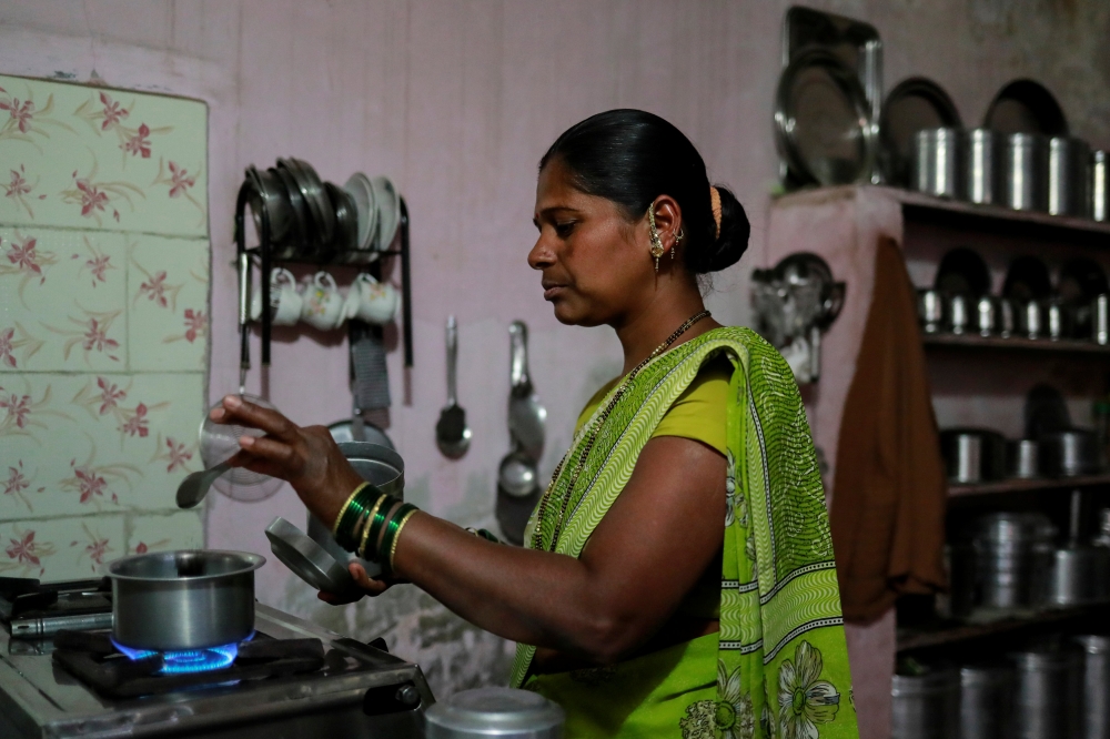 Chhaya Kharade, 36, an unemployed farm labourer makes tea inside her house in Chincholi, India, March 12, 2019. Reuters/Danish Siddiqui