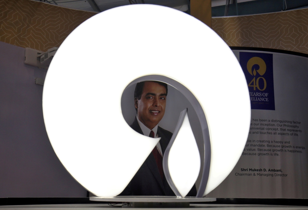 The logo of Reliance Industries is pictured in a stall at the Vibrant Gujarat Global Trade Show at Gandhinagar, India, January 17, 2019. Reuters/Amit Dave