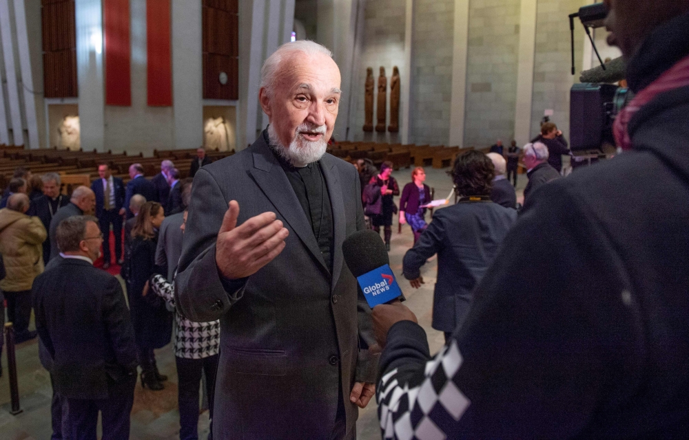Catholic Priest Claude Grou speaks at a press conference on March 1, 2019, about the work to be done at Saint Joseph's Oratory in Montreal.  AFP / Sébastien St-Jean 