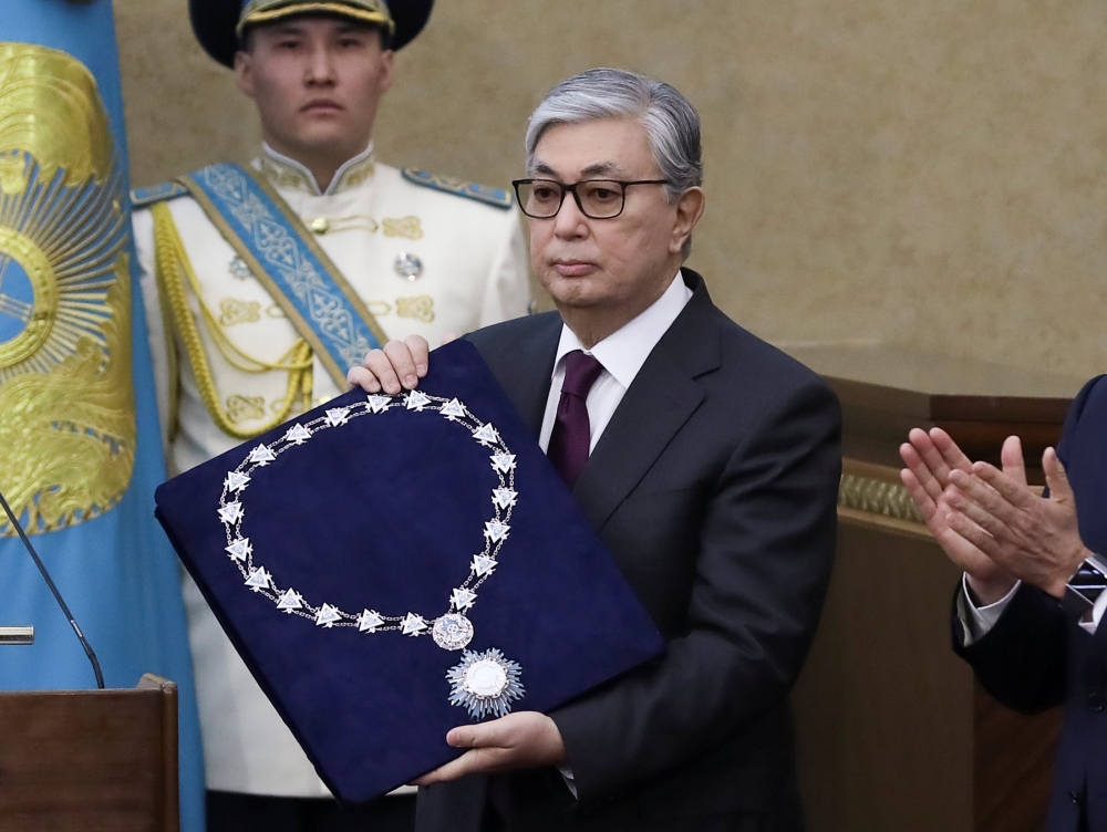 FILE PHOTO: Acting President of Kazakhstan Kassym-Jomart Tokayev takes part in a swearing-in ceremony during a joint session of the houses of parliament in Astana, Kazakhstan March 20, 2019. REUTERS/Mukhtar Kholdorbekov