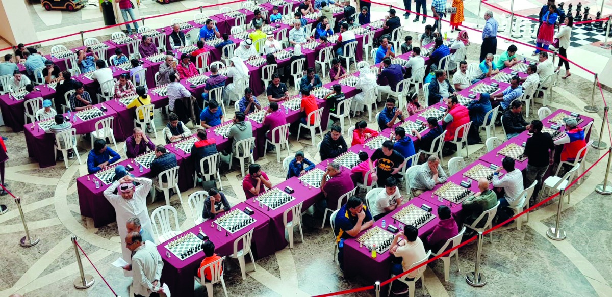 Participants at the Qatargas Chess Tournament are seen planning their next moves during the three-day events held at Al Mirqab Mall in Doha.