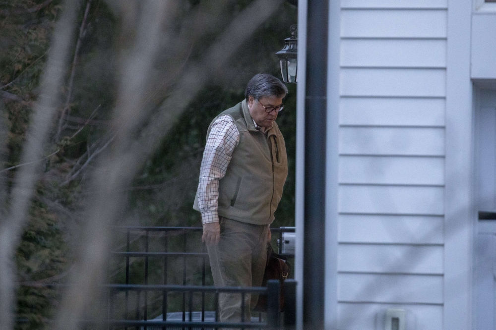 U.S. Attorney General William Barr returns to his house on March 24, 2019 in McLean, Virginia. Special Counsel Robert Mueller has concluded his investigation into allegations of Russian interference in the 2016 presidential election. Tasos Katopodis/Getty